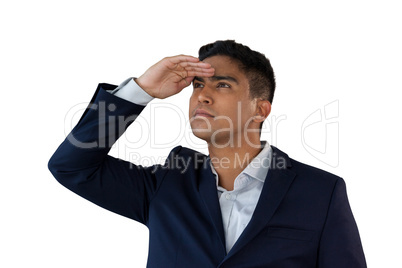 Close up of young businessman shielding eyes