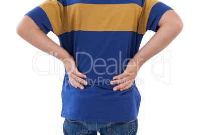 Mid-section of boy having an back pain