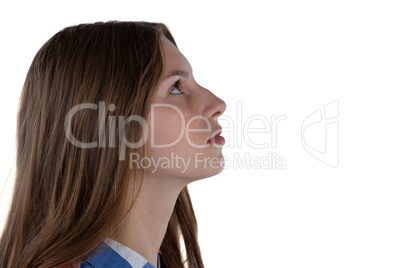 Teenage girl against white background