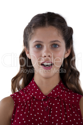 Teenage girl standing against white background