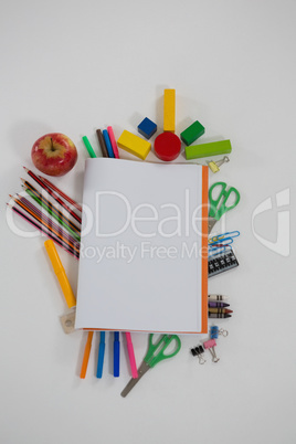 Various school supplies arranged on white background