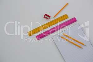 Various school supplies on white background
