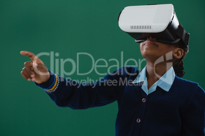 Schoolgirl using virtual reality headset