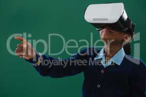 Schoolgirl using virtual reality headset