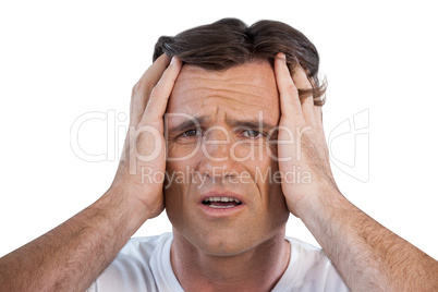 Close up of frustrated mature man with head in hand