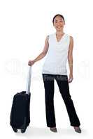Portrait of young businesswoman with luggage