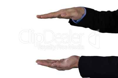 Cropped image of businessman holding invisible product