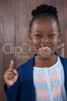 Close-up portrait of cheerful businesswoman gesturing