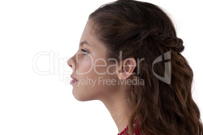 Teenage girl against white background