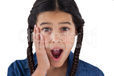 Cute girl surprised against white background