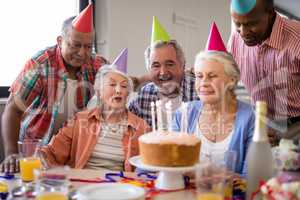 Happy senior people celebrating birthday