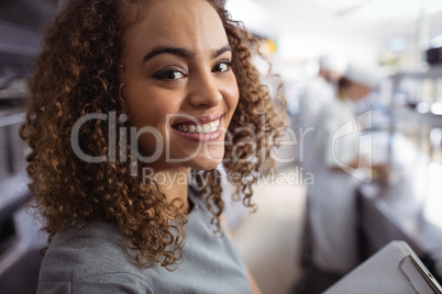 Portrait of smiling restaurant manager