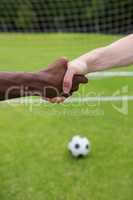 Close up of soccer player doing handshake
