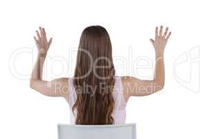 Girl pressing an invisible virtual screen against white background