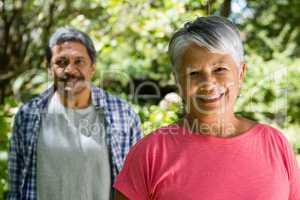 Portrait of senior couple in garden