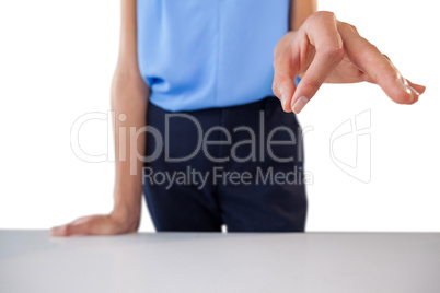 Businesswoman showing something at table