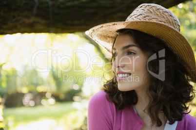 Smiling beautiful woman in garden