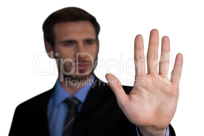 Close up of businessman touching palm on invisible interface