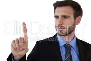 Close up of mid adult businessman using invisible interface