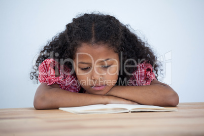 Close up of businesswoman reading book