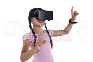 Teenage girl using virtual reality headset