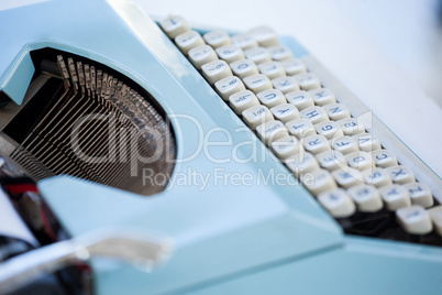 Close up of blue typewriter