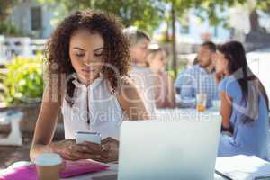 Beautiful woman using mobile phone