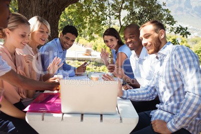 Group of friends video chatting on laptop