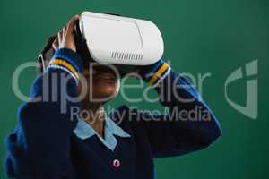 Schoolgirl using virtual reality headset