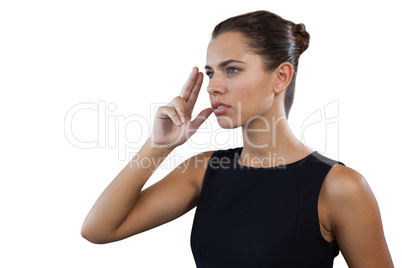 Close up of thoughtful businesswoman gesturing while looking away
