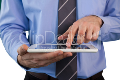 Mid section of businessman using tablet Mid section of businessman using tablet