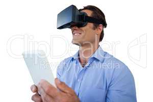 Close up of businessman with tablet using vr glasses