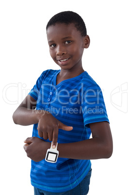 Smiling boy showing his smart watch