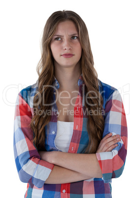 Teenage girl standing against white background