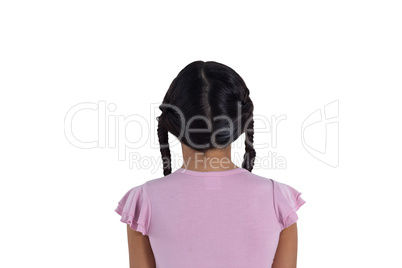 Girl standing against white background