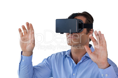 Close up of businessman gesturing while wearing vr glasses