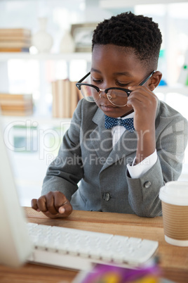 Businessman using computer in office