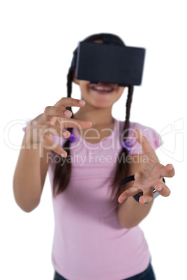 Teenage girl using virtual reality headset