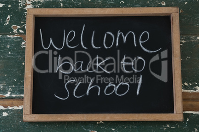 Welcome back to school text written on chalkboard
