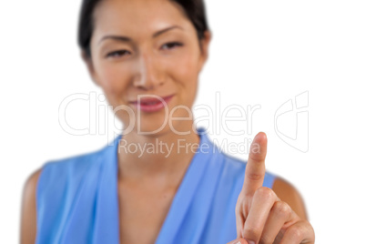 Close up of smiling businesswoman touching interface