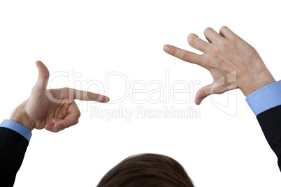 Cropped image of businessman doing finger frame gesture