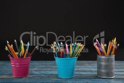 Color pencils arranged in pencil holder