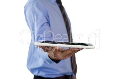 Side view of businessman with tablet computer