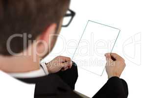 High angle view of businessman holding glass interface