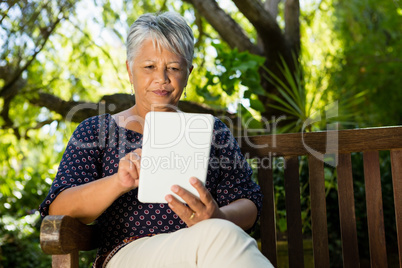 Senior woman using digital tablet