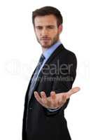Businessman gesturing while standing