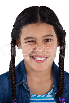 Girl standing against white background