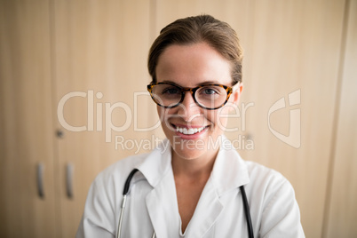 Close-up of smiling female doctor wearing eyeglasses