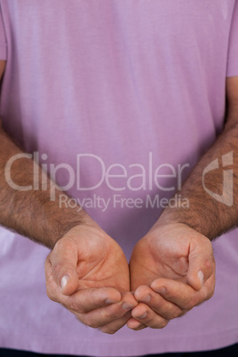 Full frame shot of man with hands cupped