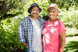 Happy senior couple enjoying in garden